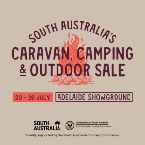 Graphic promoting the South Australia's Caravan, Camping and Outdoor Sale at the Adelaide Showground from 23 to 26 July, featuring a campfire illustration and event details.