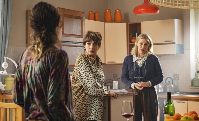 Three women talking in a kitchen in a scene from Twin Stars, screening at the 2026 ST. ALi Italian Film Festival.